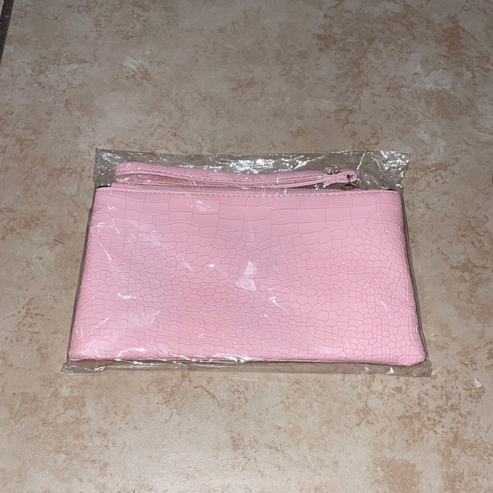 Pink snakeskin wristlet
